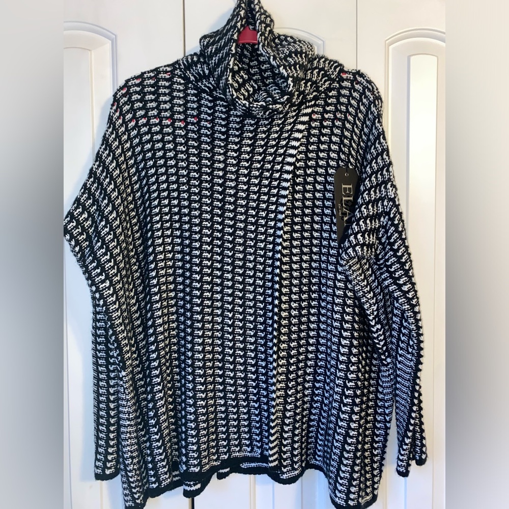 Elan Turtleneck Sweater w/ Unique Detail